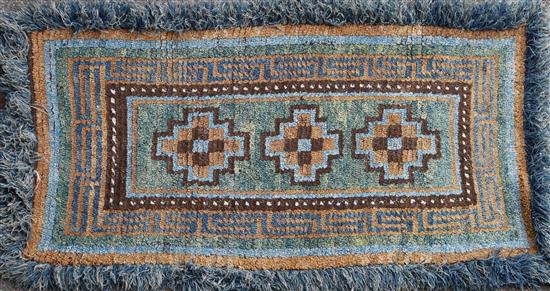 A Tibetan Wangden rug, 20th century, 170 x 92cm including fringe